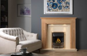 Atwick Fireplace Suite in Light Oak Veneered MDF with Perla Marble Back Panel and Hearth, with Gallery Aurora Antique Brass Finish, with Open-Fronted Gas Convector Fire