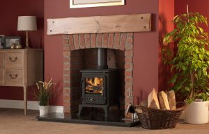 Firefox 5.1 Multi-Fuel Stove with Rustic Brick Chamber with Front Returns and Arch, Slabbed Granite Hearth, Slabbed Granite Back Hearth, 54" Croft Pine Beam