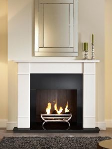 Brompton 56" Agean limestone mantel, Large Cradle polished fire basket, real log fire, granite slips, black painted reeded fireboard chamber, 54" slabbed granite hearth and slabbed granite back hearth.