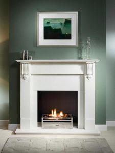 Richmond 54" Agean limestone mantel with Krypton fire basket with back in polished finish, decorative gas fire with ceramic logs, black painted reeded fireboard chamber, Agean limestone slips, 54" Agean limestone hearth and Agean limestone back hearth