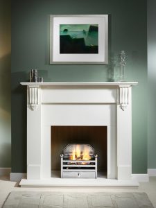 Richmond 54" Agean Limestone mantel with Elan fire basket with back in full polished finish, decorative gas fire with ceramic logs, Agean limestone slips, natural reeded fireboard chamber, 54" Agean limestone hearth and Agean limestone back hearth